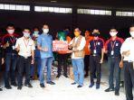 alfamidi-salurkan-paket-sembako-peduli-dari-donasi-di-luwu-utara-1.jpg