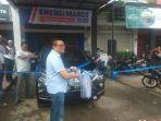 amirullah-nur-saenong-saat-meluncurkan-mobil-rakyat-di-posko-pemenangannya-jl-gladio.jpg