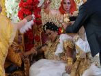 astaga-evi-masamba-pingsan-di-pelaminan-ternyata-ini-penyebabnya_20181024_132918.jpg