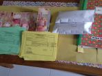 barang-bukti-uang-hasil-ott-di-smpn-1-bupon-diamankan-tim-saber-pungli-kabupaten-luwu_20180711_144541.jpg