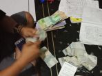 barang-bukti-yang-diamankan-hadil-judi-rolet_20180712_120222.jpg