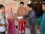 bawaslu-se-sulsel-berikan-bantuan-bagi-korban-kebakaran-di-lewaja-enrekang.jpg