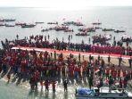 bendera-merah-putih-sepanjang-74-meter-dibentangkan-di-tangkulara-bone.jpg