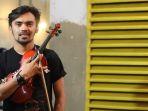bincang-tribun-cerita-ojol-main-biola-si-agogo-violin-awal-mula-buat-video-hingga-viral-part-1.jpg