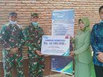 bpjs-ketenagakerjaan-memberikan-santunan-kepada-ahli-waris-istri-almarhum-peltu-yusrah.jpg