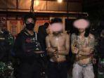 buang-badik-dan-coba-kabur-dua-pemuda-diringkus-tim-patroli-gabungan-psbb-di-jl-rajawali-makassar.jpg