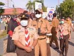 bupati-sinjai-asa-bersama-kwartir-pramuka-di-tugu-sinjai-bersatu-bagikan-masker-ke-pengendara.jpg
