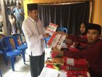 calon-bupati-sidrap-dollah-mando-menggunakan-hak-pilihnya-di-tps-002_20180627_141106.jpg
