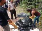 ciri-cirinya-umur-40-tahun-hilang-sepekan-lalu-mayat-pria-di-dalam-koper-biru-terbungkus-plastik.jpg