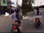 cuplikan-video-wanita-buka-rok-pamer-celana-dalam-saat-naik-motor.jpg
