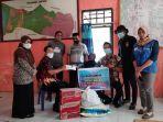 dinsos-p2kbp3a-kabupaten-wajo-menyalurkan-santunan-ke-sejumlah-korban-bencana.jpg