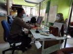 dokter-umum-puskesmas-pampang-dr-aulia-recitra-kasim-saat-melapor-ke-spkt-polsek-panakkukang.jpg