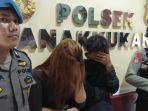 dua-pasangan-suami-istri-ihsan-dan-elsera-saat-diamankan-di-kantor-polsek-panakkukang.jpg