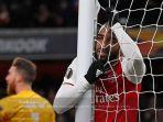ekspresi-kecewa-striker-arsenal-alexandre-lacazette-dalam-duel-kontra-olympiacos.jpg