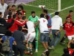 ekspresi-pemain-mesir-saat-memastikan-lolos-ke-piala-dunia-2018_20171009_081302.jpg