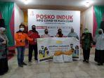 enyerahan-masker-pt-eastern-pearl-ke-pkk-makassar54f.jpg