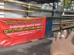 gerbang-masuk-anjungan-pantai-losari-jl-penghibur-kota-makassar-dipagari-bambu.jpg