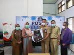 hasnah-syam-mars-menyalurkan-bantuan-ke-tim-satgas-penanganan-covid-19-barru.jpg