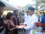 irwan-bachri-syam-serahkan-bantuan-dana-rp-220.jpg