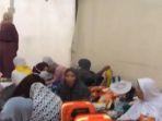 jemaah-haji-mengungsi-saat-ada-dalam-suasana-badai-hujan-di-mina-mekkah.jpg