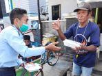 kantor-imigrasi-mamuju-bagi-bagi-masker-suplemen-vitamin-dan-nasi-kotak.jpg