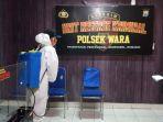 kantor-polsek-wara-disemprot-disinfektan.jpg