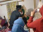 kd-saat-melangsungkan-pernikahan-di-rumah-mempelai-perempuan-di-batu-bassi-desa-pallantikan.jpg
