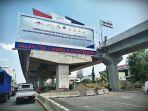 kendaraan-melintas-di-bawah-jembatan-tol-layang-ap-pettarani-makassar-1.jpg