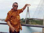 kepala-dinas-transmigrasi-tenaga-kerja-dan-industri-luwu-timur-firnandus-ali.jpg