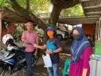 ketua-alumni-psh-18-zulqarnain-memimpin-pembagian-masker-kepada-warga.jpg
