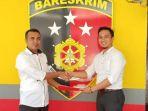 ketua-bawaslu-suharno-dan-kasat-reskrim-iptu-arham-gusdiar.jpg