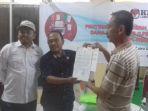 ketua-dpc-pdip-luwu-utara-akib-baendon-masukkan-laporan.jpg