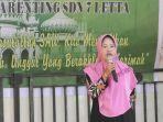 ketua-panitia-syamsiah-dalam-peringatan-maulid-rasulullah-saw.jpg