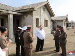 kim-jong-un-memantau-perumahan-di-korea-utara.jpg