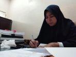 komisioner-divisi-data-dan-informasi-kpu-luwu-timur-hastuti.jpg