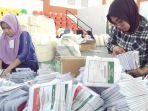 kpu-enrekang-mulai-melakukan-penyortiran-dan-pelipatan-surat-suara-di-gor-massenrempulu.jpg