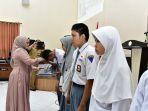 lies-f-nurdin-serahkan-bantuan-ke-2500-siswa-3.jpg