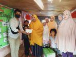 manajemen-baruga-asrinusa-development-menyerahkan-secara-simbolis-bantuan.jpg