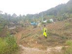 material-longsor-menutup-akses-jalan-menuju-lima-desa-di-kecamatan-tabulahan.jpg