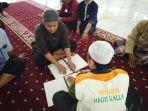 menggelar-baca-Al-Quran-Braille.jpg