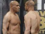 mike-tyson-vs-roy-jones-jr-3.jpg