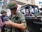 milisi-pro-rusia-pamerkan-senjata-nato-yang-ditahan.jpg