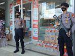 mini-market-di-jl-ir-juanda-kabupaten-mamuju-dijaga-polisi-rabu-2012021-pagi.jpg