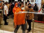 pasangan-moh-ramadhan-danny-pomanto-fatmawati-rusdi-berjalan-memasuki-ruang-penetapan.jpg