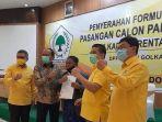 pasangan-yohanis-bassang-dan-frederick-victor-palimbong-ombas-dedy.jpg