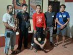 pelaku-aa-23-saat-diamankan-oleh-unit-1-tim-khusus-polsek-tanete-riattang.jpg