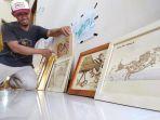 pembuatan-lukisan-bertema-rock-art-menggunakan-jati-dan-solder.jpg