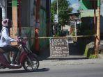 pengendara-melintas-di-depan-lorong-bungu9.jpg<pf>pengendara-melintas-sa.jpg