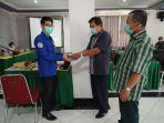 penyerahan-kartu-peserta-bpjs-ketenagakerjaan.jpg
