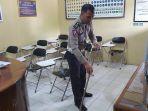 personel-sat-lantas-polres-enrekang-pelaksana-sim-melakukan-kerja-bakti.jpg